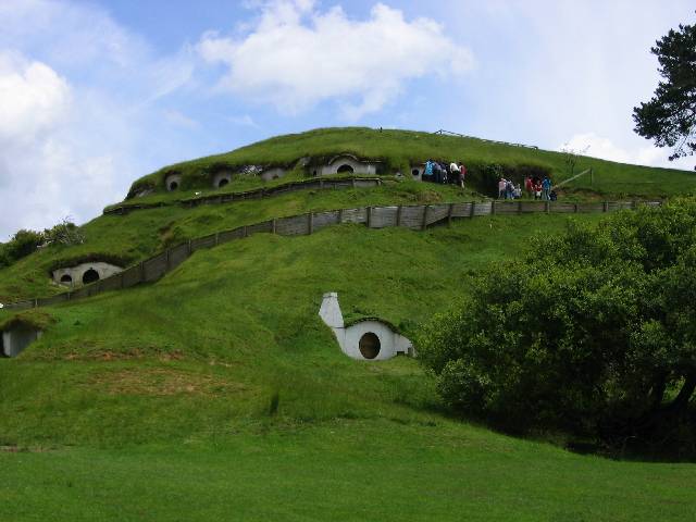 24-Hobbiton Hobbiton ... 17 of the original 34 hobbit holes still exist ... after filming of FOTR was complete, New Line started removing the ones further down the hill, but then rainy winter set in and forced them to halt deconstruction ... over the winter neighbours convinced the Alexander brothers to ask New Line about leaving the rest of the hobbit holes intact and starting up a tour